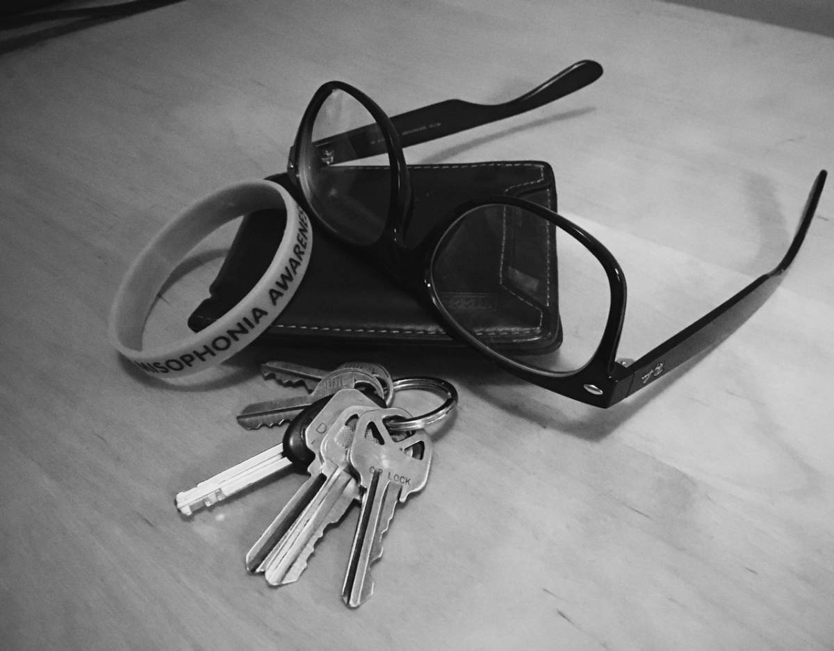 Misophonia awareness bracelet, keys, wallet and glasses