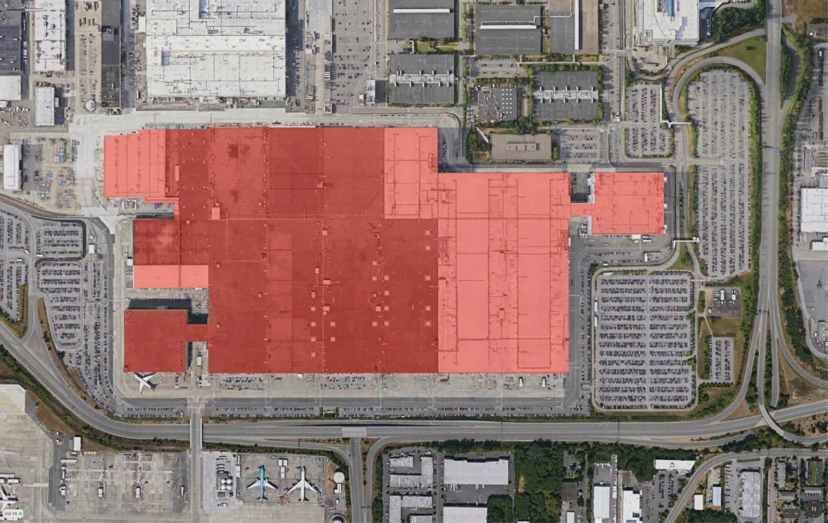 Arial photo of the Boeing Factory in Everett, WA with the building perimeter highlighted in red